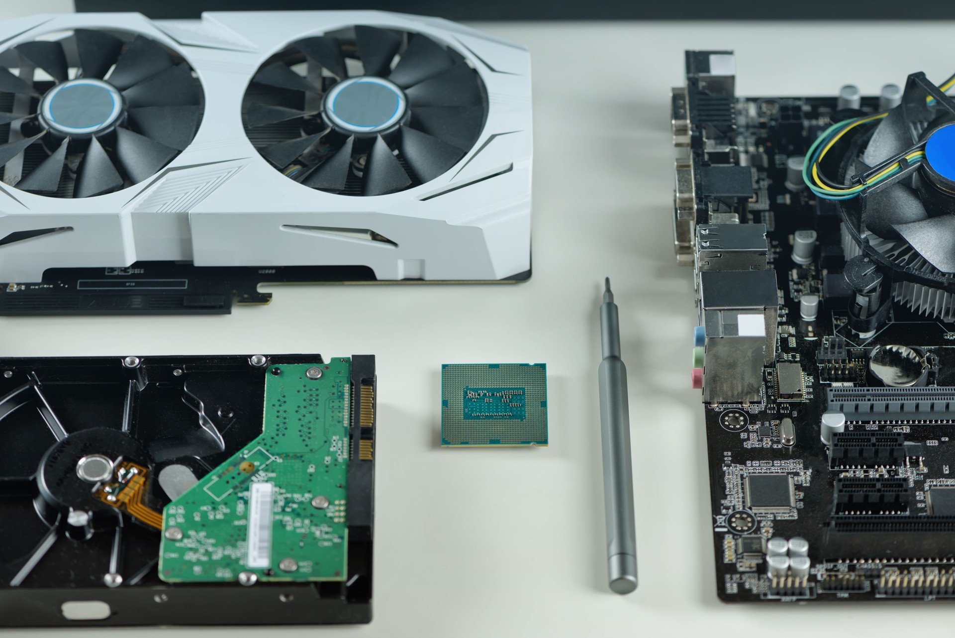 Computer parts. Processor, motherboard, hard drive, video card.